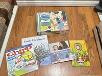 Front view showing all six items: craft kit and five books