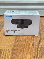 Front view of boxed EMEET SmartCam C960 webcam