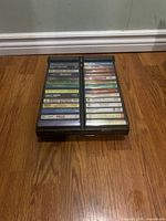 Front view of cassette case showing both columns of tapes