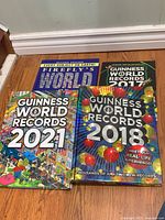All four books laid out showing covers