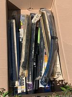 Open box showing multiple packaged wiper blades