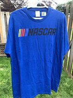Front view showing NASCAR logo and overall garment