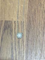 Close-up of square cubic zirconia pendant