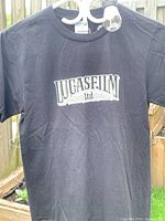 Front view showing Lucasfilm Ltd graphic on black T-shirt