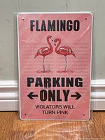 Front view of sealed flamingo parking sign