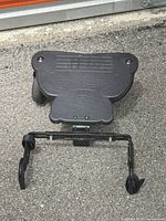 Top view of buggy board and detached metal arms