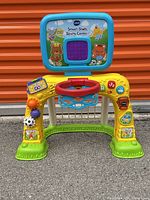 Front view showing scoreboard, hoop, base graphics