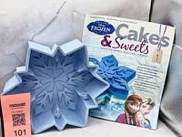 Snowflake silicone mold beside Cakes & Sweets Issue 1 magazine