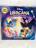 Front view of sealed Disney Lorcana Gateway trading card game box