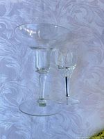 Large coupe and small cordial glass side by side