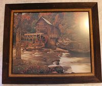 Front view of framed print showing mill scene and frame details