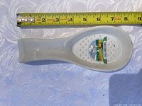 Top view of spoon showing Yellowstone decal and ruler indicating length