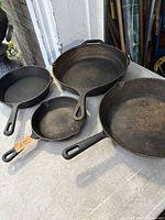 All four Jim Beam cast iron frying pans view