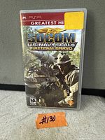 Front view of PSP SOCOM U.S. Navy SEALs Fireteam Bravo Greatest Hits case