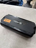 Closed Conair-branded hard case