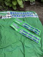Green Quarterback Pass Attack panel with scoreboard strips