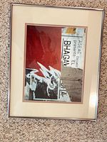 Front view showing entire framed print with mat and metal frame