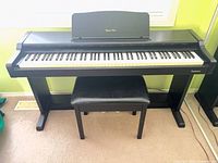 Front view of Technics digital piano with bench