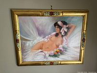 Full view of framed portrait on wall