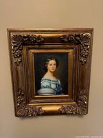 Frontal view of framed portrait