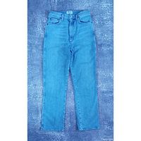 Full view of jeans laid flat front side