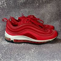 Lateral side view of both sneakers showing overall condition and colourway