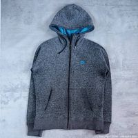 Front view of grey wool-blend Nike hoodie with blue lining
