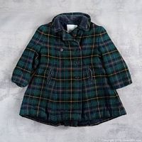 Full front view of plaid peacoat