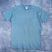 Full front view of grey Jerzees blank T-shirt laid flat