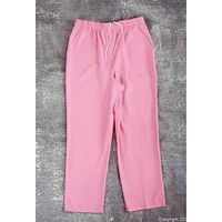Full view of pink high-waist pants front side