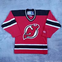 Front view of red New Jersey Devils CCM jersey