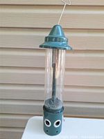 Full view of bird feeder showing overall design and height