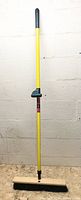 Full view of broom showing handle length and head