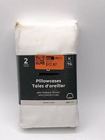 Front of sealed package showing two king size white satin pillowcases, 400 thread count, 2 pieces