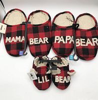 All three pairs of slippers displayed: Mama Bear, Papa Bear, Lil Bear