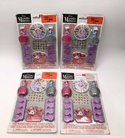 Four sealed Minnie Mouse nail art kits front view
