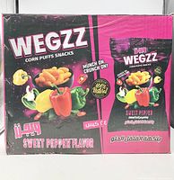 Front of sealed Wegzz Sweet Pepper Flavor corn puffs snack box
