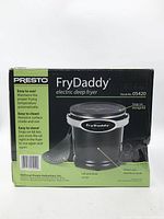 Front of Presto FryDaddy box showing product image and features