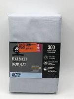 Front of packaged Hometrends double flat sheet showing brand, size, 300 thread count