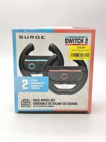 Front view of sealed Surge Race Wheel Set retail box showing product image and compatibility.