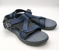 Side view of the sandals showing straps, footbed, tag loop