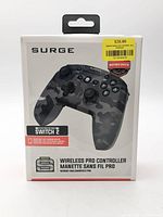 Front of retail box showing Surge camouflage Wireless Pro Controller for Nintendo Switch