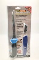 Front of sealed ToolDeal 3-piece utility knife and razor jaw set showing all components