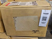 Outer carton with manufacturer name and lot label