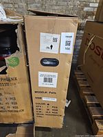 Factory shipping box with model and QC labels