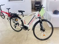 Left side view showing Dosun branding, step-through frame, rear rack and fenders