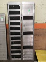 Full view of both aluminum ramps standing upright