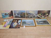 All nine paintings arranged, showing subjects and framing