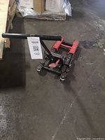 Lift jack angled view showing frame, lifting rails and handle