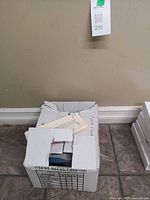 Box with stack of time cards